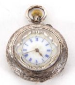 A white metal ladies pocket watch, stamped inside the case back 0.935, it has a crown wound