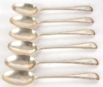 Six silver Old English pattern teaspoons with beaded edges, five hallmarked for London 1911, one for
