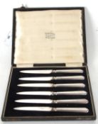A cased set of six Art Deco fruit knives, each with hallmarked silver handles for Sheffield 1926,