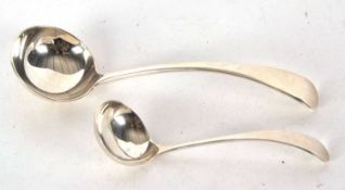 A Victorian silver Old English sauce ladle having a circular shaped bowl, plain curved handle,