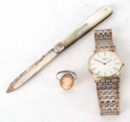 Mixed Lot: A Longines wristwatch and a mother of pearl silver bladed penknife along with a ring