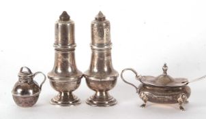Mixed Lot: A pair of hallmarked silver baluster peppers, Birmingham 1979, makers mark W I Broadway &