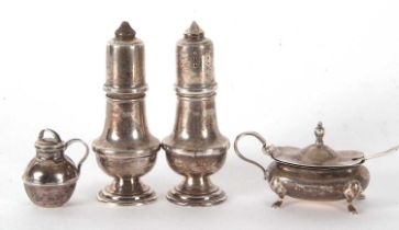 Mixed Lot: A pair of hallmarked silver baluster peppers, Birmingham 1979, makers mark W I Broadway &