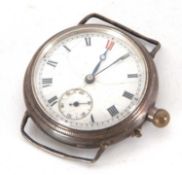 A white enamel dialled trench watch, it has a crown wound movement with a sub-second dial (a/f)