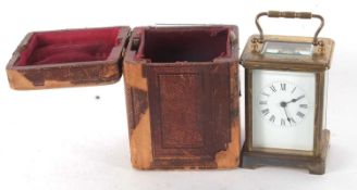 A four glass carriage clock with fitted box, it has a key wound movement, the key is also present, a