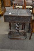 19th Century Gothic oak pedestal teapoy, rectangular hinged top with carved decoration raised on a
