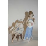 A boxed Lladro figure of a ballet dancer together with a further Lladro figure of a young girl