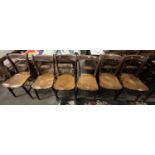 A set of six Victorian elm seated kitchen chairs with bar backs, 82cm high