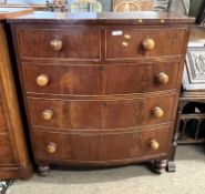 A Victorian mahogany bow front chest of two short over three long drawers, raised on turned legs,