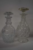 Two mid 19th Century cut glass decanters