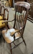A Victorian elm seated stick back Windsor chair with turned legs and H formed stretcher (Item 73