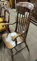 A Victorian elm seated stick back Windsor chair with turned legs and H formed stretcher (Item 73