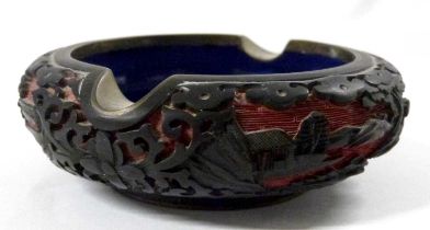 An enamel cinnabar lacquer type ashtray, 10cm diameter