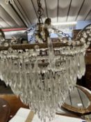 A early 20th Century circular hanging ceiling light fitting with glass prismatic drapes, 31cm