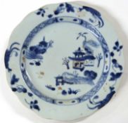 A Chinese porcelain plate, 18th Century with blue, white and iron red design from the Nanking Cargo,