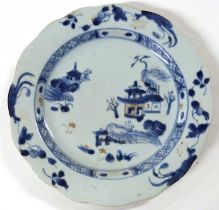 A Chinese porcelain plate, 18th Century with blue, white and iron red design from the Nanking Cargo,