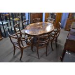 Irish Killarney yew wood breakfast table with shaped top inlaid with various scenes of houses,