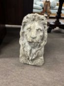 A simulated stone pottery bust of a lions head, 40cm high