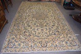 A modern pale Kashan carpet with central stylised panel, 3.10 x 2.86 metres