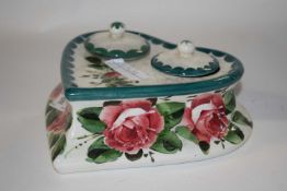 A Wemyss heart shaped ink well decorated with cabbage roses in typical fashion with two ink wells