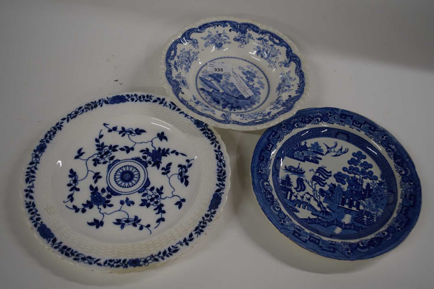 A group of Staffordshire wares including a Chinese marine scene, a Minton blue and white plate and