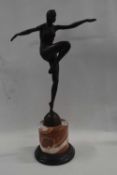 A further reproduction Art Deco figure after J Philipp on simulated marble base, 57cm high