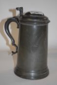 A pewter tankard in Georgian style with glass bottom, the tankard marked Pembroke College Champion