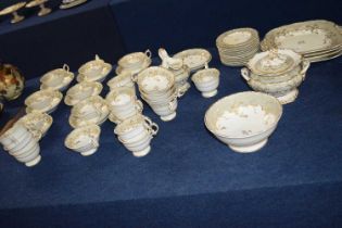 A part mid 19th Century English porcelain tea set and coffee set in Rockingham style, comprising