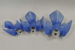 A group of Poole Pottery swallows with blue painted decoration Lot 427 in good condition - no