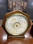 An unusual Willis World clock set in a hardwood case, 35cm high