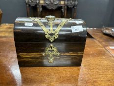 A Victorian coromandel dome topped stationery box with brass mounts and Jasper ware back, 24cm wide