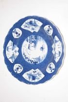A Bow porcelain plate, the powder blue ground with panels of blue and white painted decoration, 19cm