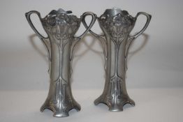 A pair of WMF Art Nouveau style pewter vases with factory stamps to base, 14cm high