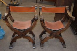 A pair of early 20th Century Savonarola type folding chairs of X shaped form, 62cm wide
