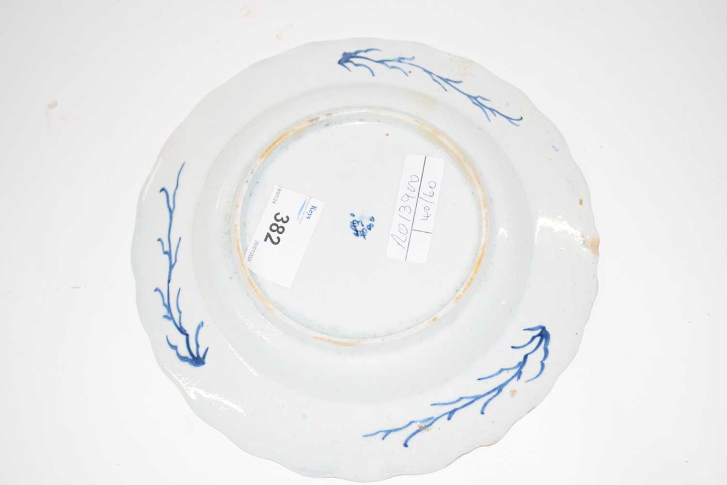 A Bow porcelain plate, the powder blue ground with panels of blue and white painted decoration, 19cm - Image 2 of 2