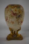 A Doulton Burslem vase, 19th Century, the globular body supported by three dolphin feet with a