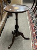 A reproduction mahogany wine table with inlaid decoration, 52cm high
