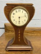 An Edwardian mahogany cased mantel clock, 25cm high