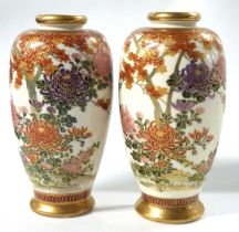 A pair of Japanese Satsuma wear vases of baluster form, one marked "Fine Satsuma China", the other