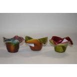 A group of three Linthorpe pottery vases or posie bowls, shape number 374