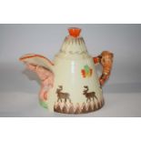 A rare Clarice Cliff novelty teepee teapot, the base marked with factory stamp and Greetings from