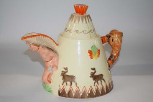 A rare Clarice Cliff novelty teepee teapot, the base marked with factory stamp and Greetings from