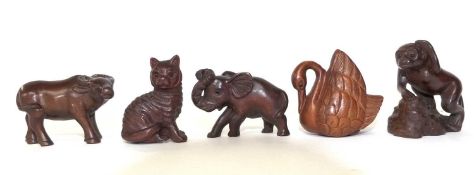 5 Netsuke carved animal figures, modelled as a swan, Elephant, cat, monkey and a buffalo
