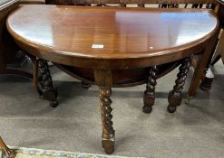 A Victorian mahogany D shaped circular drop leaf breakfast table, 105cm wide