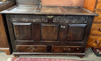 An 18th Century dark oak mule chest with lifting top and two drawers to base, 130cm wide (Item 3