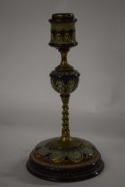 A 19th Century Lambeth Doulton candlestick by Emily Partington, 24cm high