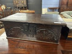 An 18th Century carved oak Bible box, 53cm wide