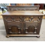 20th Century heavily carved oak side cabinet in the Jacobian style with single drawer over two