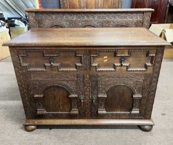 20th Century heavily carved oak side cabinet in the Jacobian style with single drawer over two