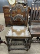 A 19th Century Yorkshire hard seated chair with shaped and carved back